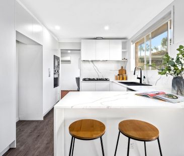 RENOVATED AND READY TO MOVE IN Three Bedroom Residence Close to All... - Photo 2