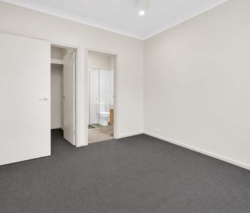 Modern Three-Bedroom Home - Photo 2