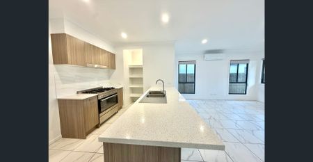 Modern 4-Bedroom Family Home in Convenient Pallara Location - Photo 5