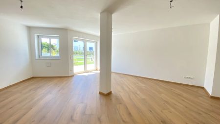 Neubauwohnung mit Garten und hervorragender Anbindung zur A94 - Photo 3