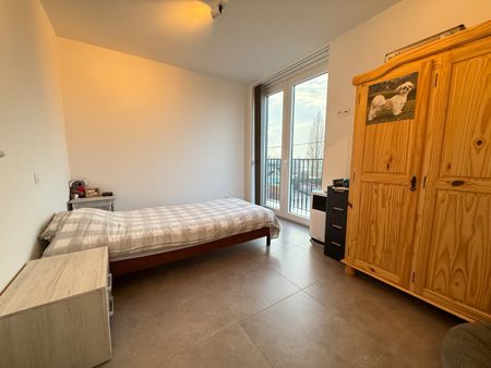 Twee-slaapkamerappartement met ondergrondse autostaanplaats in Meulebeke. - Foto 2