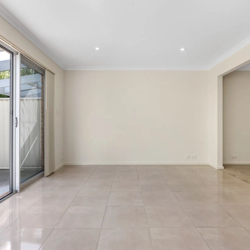 Spacious Three-Bedroom Townhouse With Multiple Living Areas - Photo 1