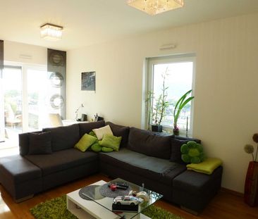 Schicke Komfortwohnung mit Dachterrasse, EBK & TG in bester Lage | ... - Photo 1