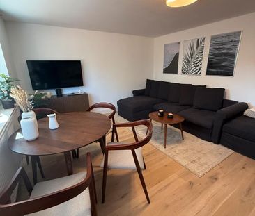 Exklusive 2-Zimmer-Wohnung in Top-Strandlage – hochwertig kernsanie... - Photo 1