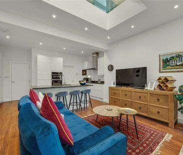 A refurbished four-bedroom family home in excellent proximity to lo... - Photo 2