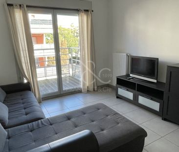 T2 meublé avec balcon et garage - Bd de l'Europe à Pierre Bénite - Photo 3