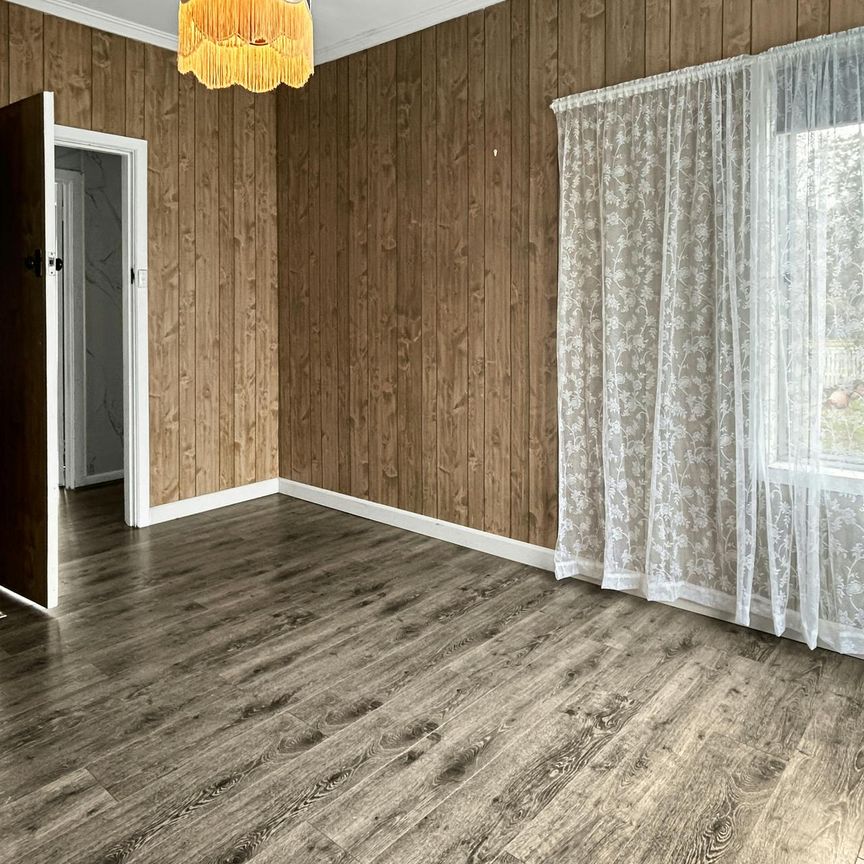 THREE-BEDROOM HOME WITH GARAGE - Photo 1