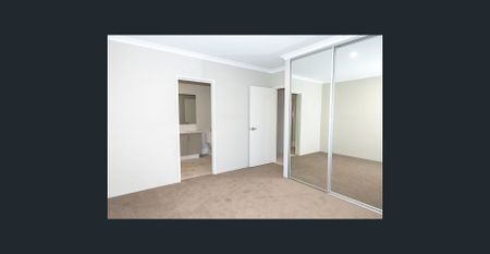 STYLISH AND LOW-MAINTENANCE HOME BY THE COAST - Photo 5