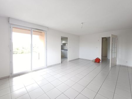 location Appartement T3 DE 60.69m² À SEILH - Photo 4