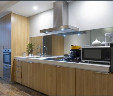 Stylish Inner-City Apartment with Resort-Style Facilities - Photo 5