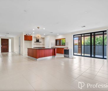 Beautiful Family Home with Multiple Living Zones & Modern Comforts! - Photo 1