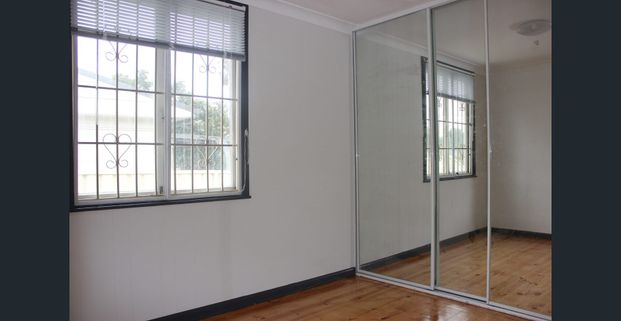 RENOVATED HOUSE WITH LOCK UP GARAGE - Photo 1