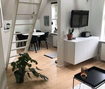 Skøn lille lejlighed med hems - Photo 2