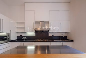 Spacious renovated apartment with balconies in a historic building