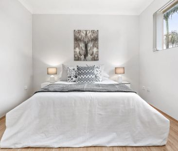 Spacious Tri-Level Townhouse in a Quiet, Convenient Setting - Photo 3