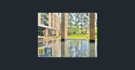 Sky and Tree Top View Apartment on Level 13 - Photo 2