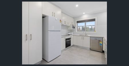 CENTRAL LIVING - RENOVATED 4 BEDROOM HOME - Photo 3