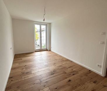 Moderne 2,5-Zimmer-Wohnung mit EBK, offenem Wohn-/Essbereich & Ankl... - Photo 3