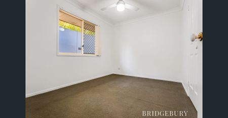 Charming Four-Bedroom Home Close to Local Amenities - Photo 5