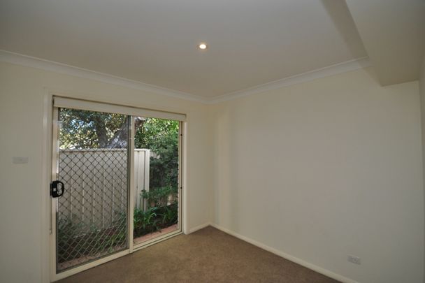 Townhouse in Ideal Location - Photo 1