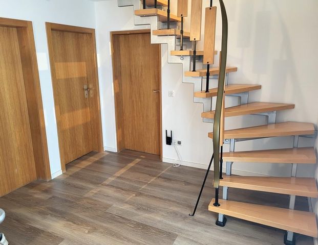 Attraktive und kernsanierte Maisonette-Wohnung mit Stellplatz in zentraler Lage von Pulheim! - Foto 1