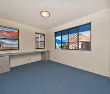 The Whole Package! Spacious 5-Bedroom Home + Sheds Galore! - Photo 3