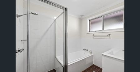 Coastal Tranquility Meets Modern Efficiency: Immaculate Family Living - Photo 3