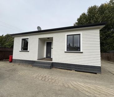 Renovated Okoia home - Photo 3