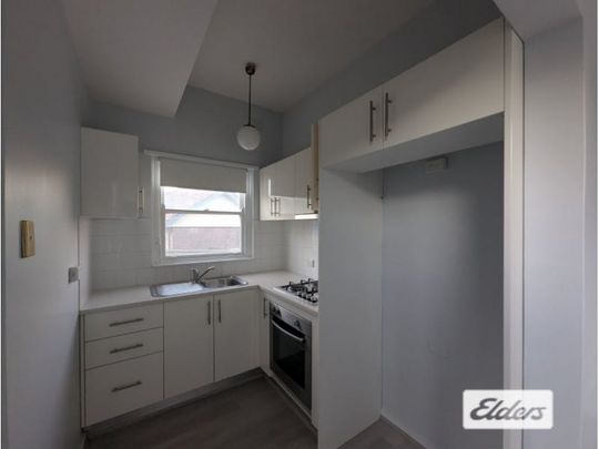 Spacious 2-Bedroom Duplex in Convenient Location - Photo 1