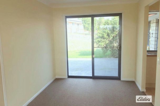 Practical 4-Bedroom Brick Home - Photo 1