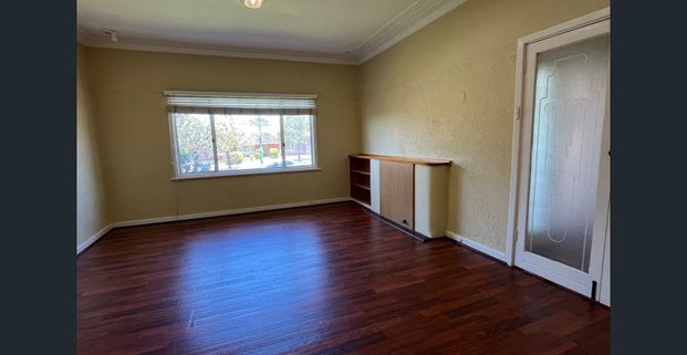 Charming Elevated Home - Photo 1