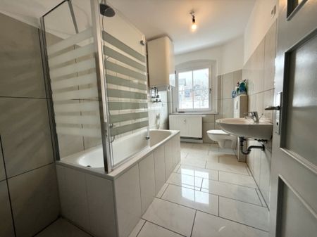 Kernsaniert: 3-Zimmer-Wohnung mit Garage und gemeinschaftlichem Garten - Foto 4