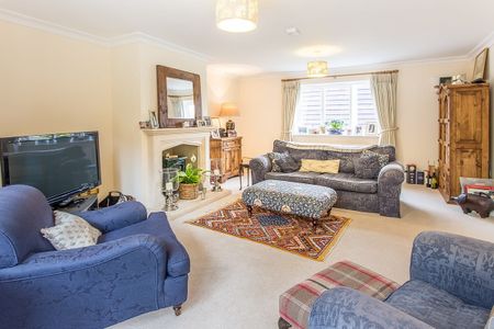 A modern detached family home, offering spacious and flexible living in a pretty village location. - Photo 2