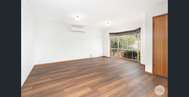 NEAT 3 BEDROOM HOME - PERFECT FOR A YOUNG FAMILY! - Photo 1