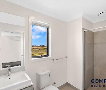 Beautifully Designed Four-Bedroom Home with Modern Comforts - Photo 6