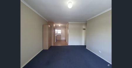 NEAT & TIDY TWO BEDROOM UNIT! - Photo 2