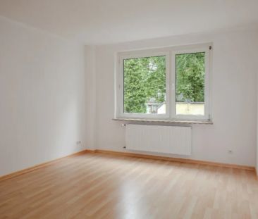 Schöne 2-Zimmer-Wohnung mit Balkon in gepflegtem Mehrfamilienhaus - Foto 2