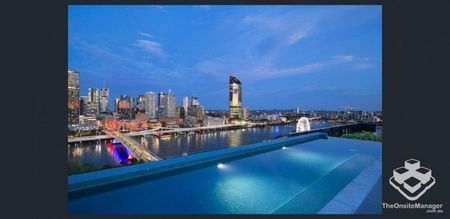 Fully Furnished 2 bedroom in prime location with city & river views - Photo 2