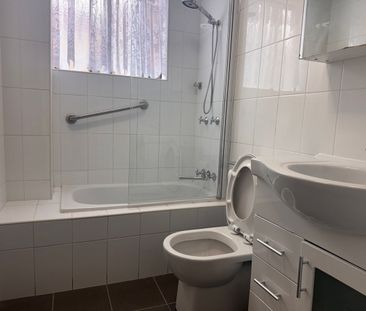 1st Floor Renovated 3 Bedroom Unit - Photo 1