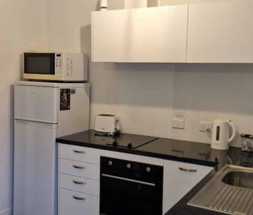 Fully Furnished Lock up and Leave - Photo 1