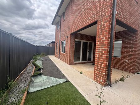 Modern Comforts Await in This 4-Bedroom, 2-Bathroom Home - Photo 3