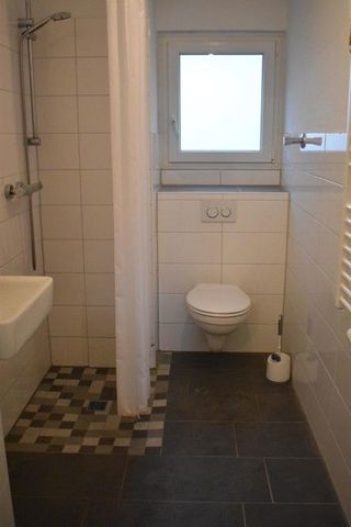 Top modernisiert! 1,5 Raum Wohnung im Herzen Evings - Photo 2