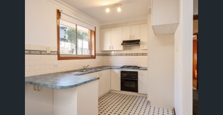 Stylish Two-Bedroom Unit with Private Garden & Easy Access to Amenities - Photo 5