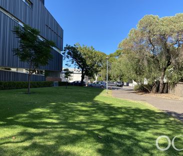 Open the Door To Parkside Living in a Spacious Kensington Townhome - Photo 5