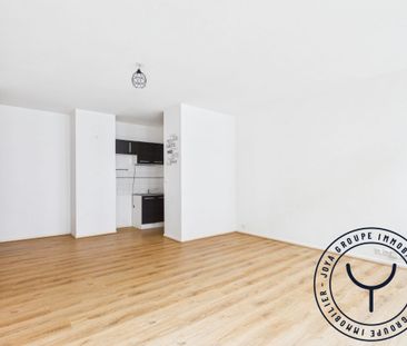 En plein centre ville avec stationnement - Photo 1