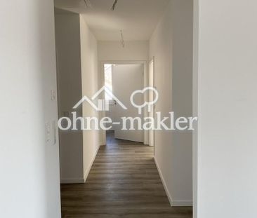 Lichtdurchflutete Neubauwohnung mit Einbauküche und großem Balkon i... - Photo 1