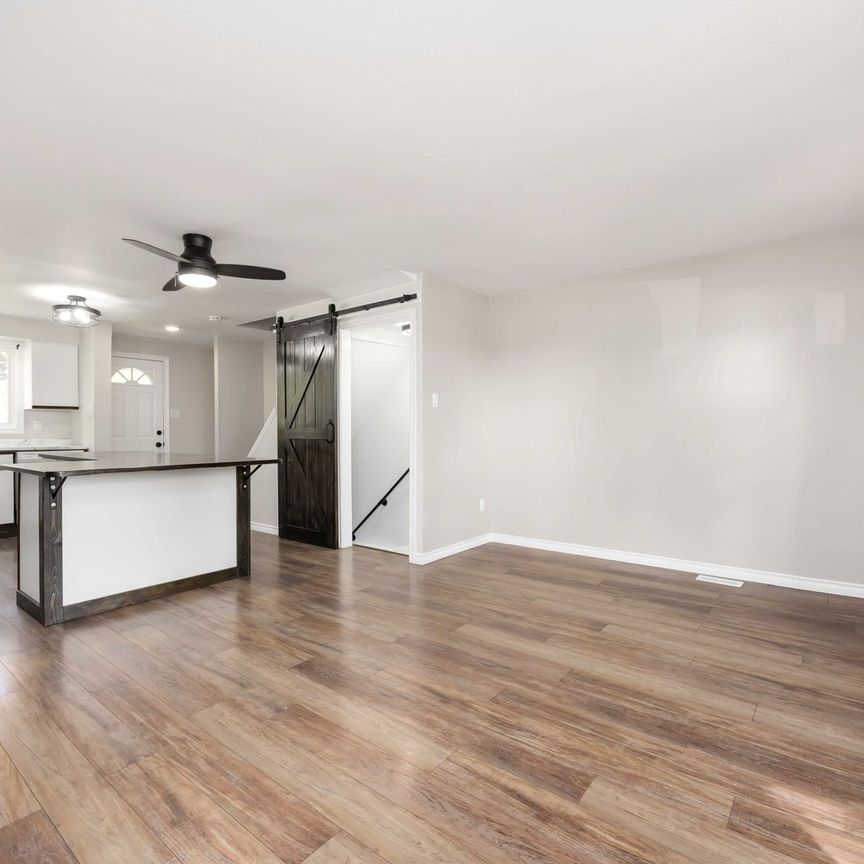 Bright &amp; Updated 3 Bedroom Townhouse with Basement and Private Outdoor Space - Photo 1