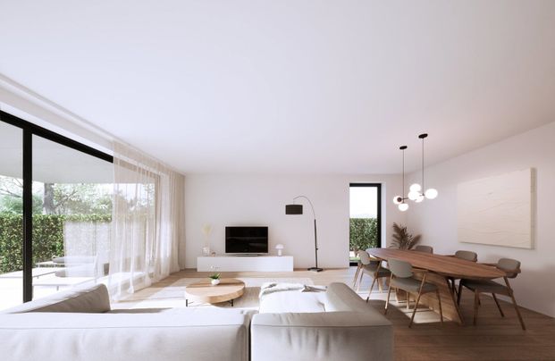 Prestigieus nieuwbouwappartement met ruime tuin en terras. - Photo 1