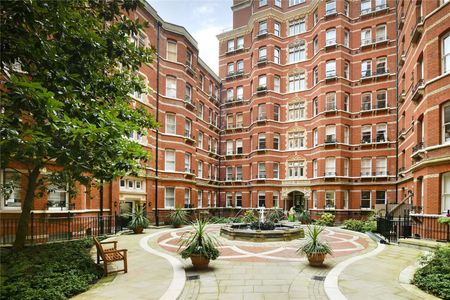 Beautiful 2 double bedroom apartment in a prime SW1 development with 24 hour concierge. At over 1,000 sq. ft. this 2nd floor apartment is well proportioned, spacious and bright. - Photo 2