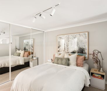 Bright & Modern Apartment with City Views + Parking - Photo 2